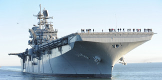 U.S. ship fires warning shots at Iranian vessel