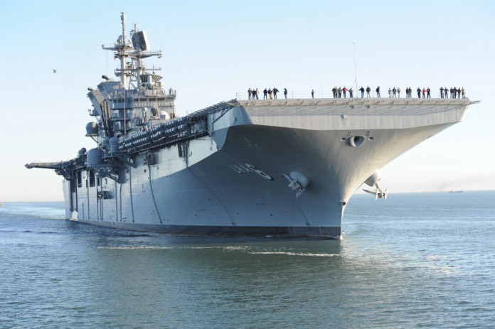 U.S. ship fires warning shots at Iranian vessel U.S. ship fires warning shots at Iranian vessel
