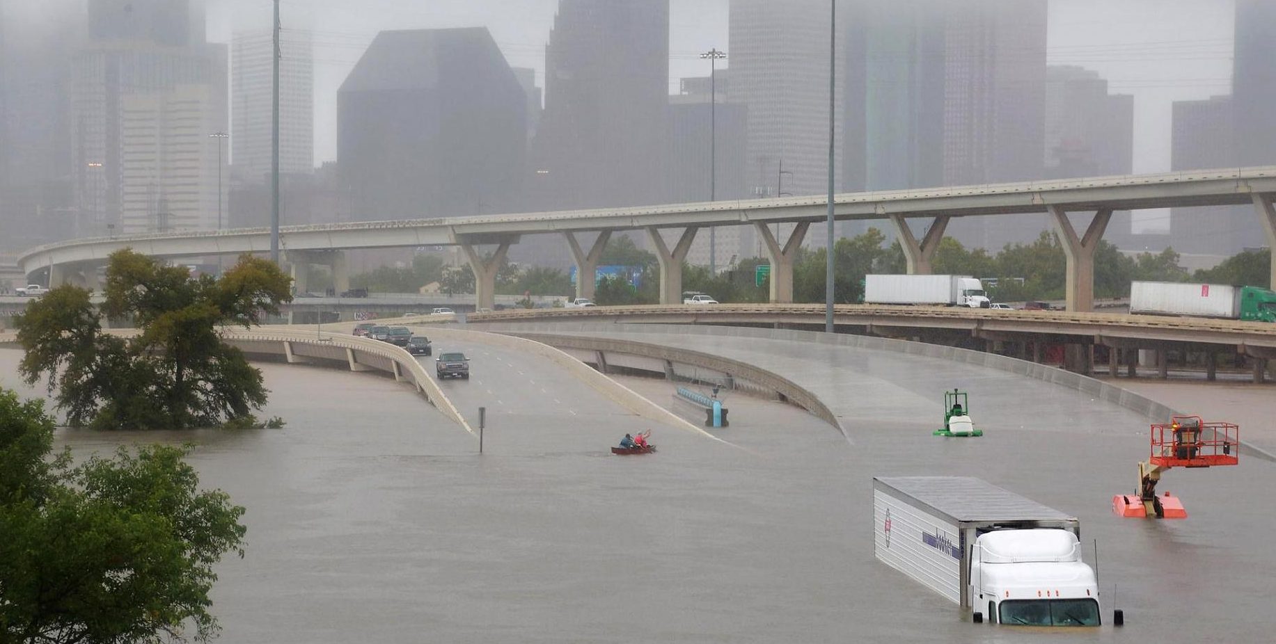 Rescuers start block-by-block search of flooded Houston