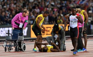 Usain Bolt pulls up injured in final race of his career