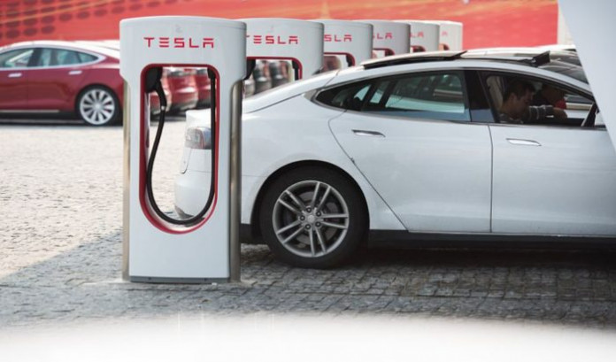 CHINA-AUTO-SHOW-ENVIRONMENT-TESLA China’s sale of electric cars soars