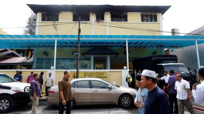 School fire kills students, teachers