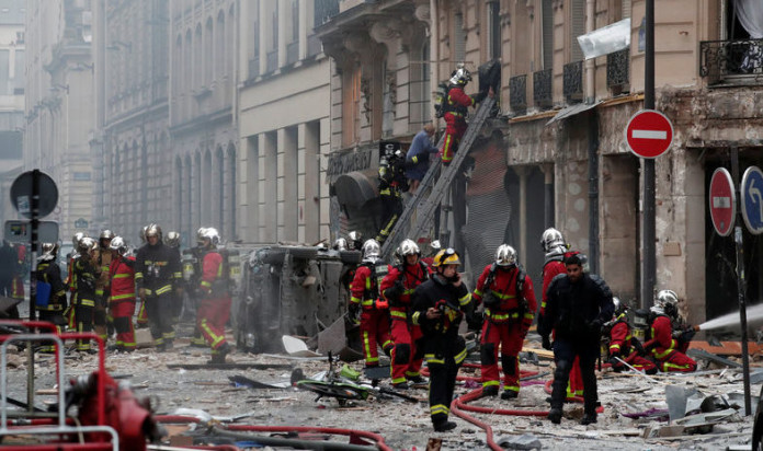 Firemen work at the site of an explosion in a bakery shop in the 9th District in Paris Two dead in Paris gas blast amid lockdown for yellow-vest protests