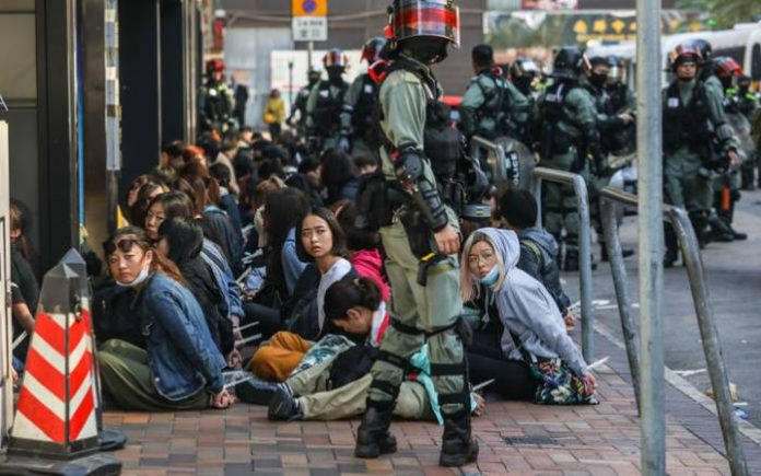 Hong Kong Unibersity Hong Kong Polytechnic University: Police Surround Campus After Night Of Violence