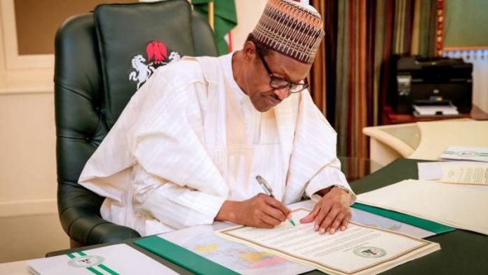 Buhari 1 President Buhari Signs 2018 Executive Order On Voluntary Overseas Asset Declaration
