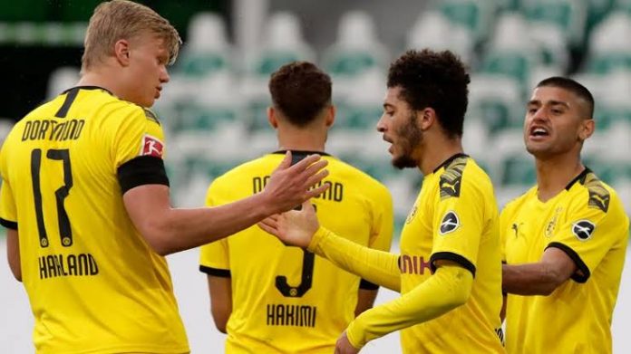 images (20) Dortmund Ease Past Wolfsburg 2-0 To Stay In Title Hunt