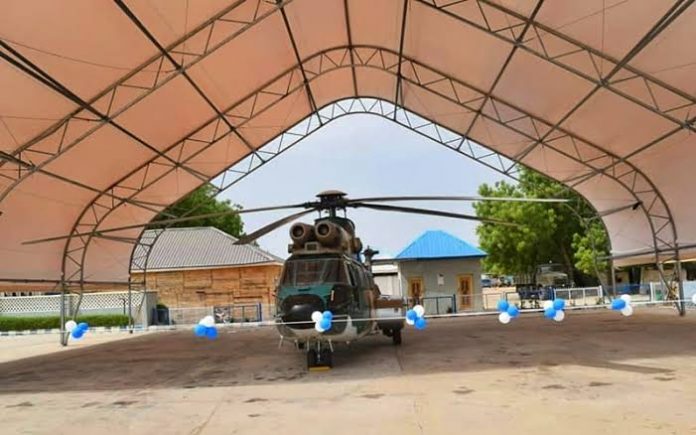 images (3) Anti-banditry Air Operations: NAF Constructs Aircraft Shelters