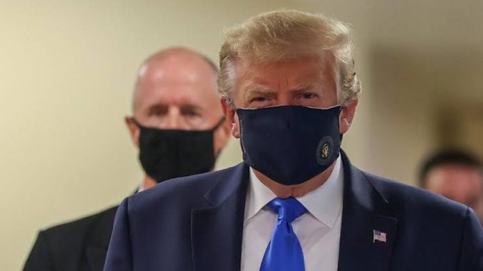 Trump Shocks Critics, Wears Mask In Public
