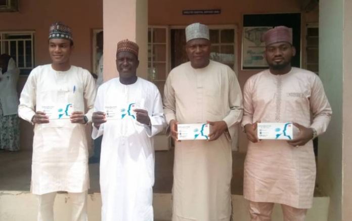 Ibrahim Mohammed, Dr. Habu Dahiru, State Commissioner of Health, his Perm Sec and Suleiman Babayo showcasing the Oraquick testing kits presented to Gombe State. Ibrahim Mohammed, Dr. Habu Dahiru, State Commissioner of Health, his Perm Sec and Suleiman Babayo showcasing the Oraquick testing kits presented to Gombe State.