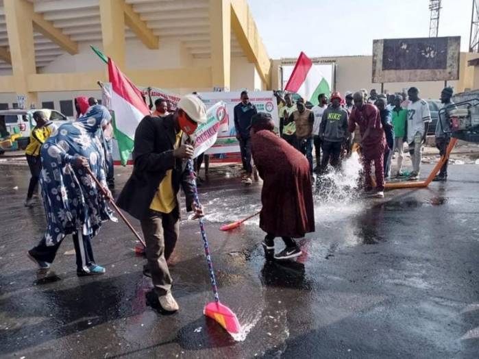 Drama As PDP Members In Plateau Clean Jos Venue Of APC Presidential Flag-off
